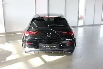 Gebraucht Mercedes CLA250 AMG Line Premium Plus 163 PS (119 kW) 2023 Metalliclack kosmosschwarz Coupé