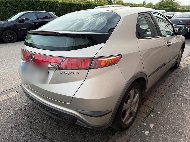 Second-hand Honda Civic 83 CP (61 kW) 2007 Auriu Hatchback