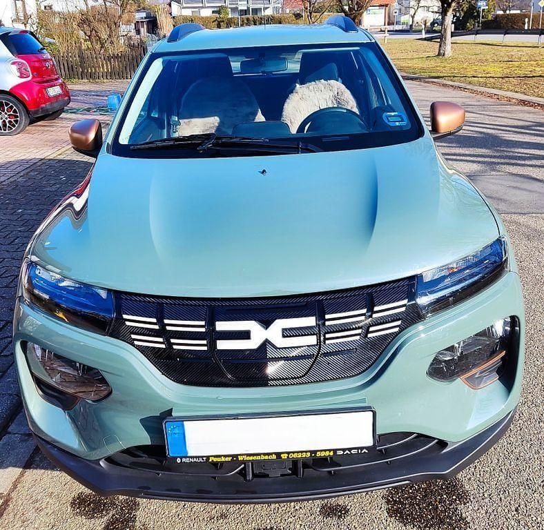 Gebraucht Dacia Spring Extreme 47 kW (65 PS) 2024 Grün Kleinwagen