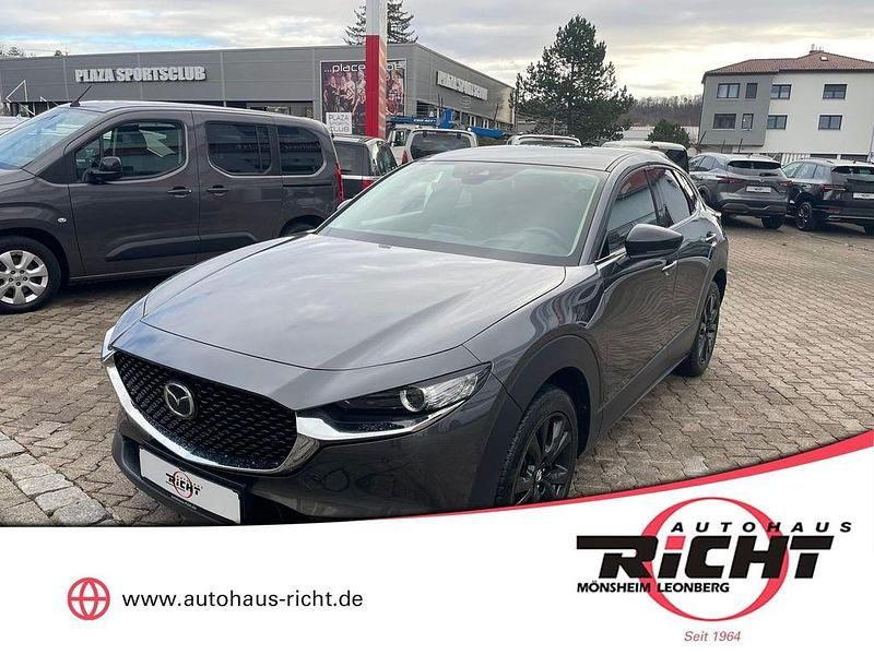 Machine gray Gebraucht 2022 Mazda CX-30 Homura-Line SUV | 21.980 € (Fairer Preis) - Bild 1/4