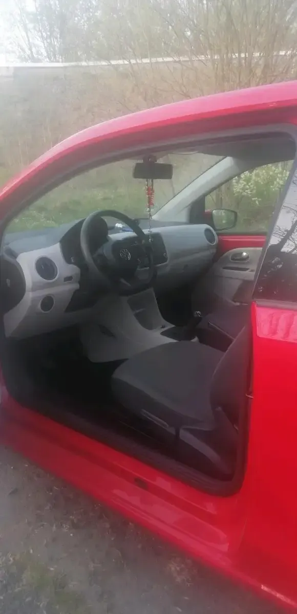 Käytetty VW up! 60 HP (44 kW) 2012 Punainen Viistoperä