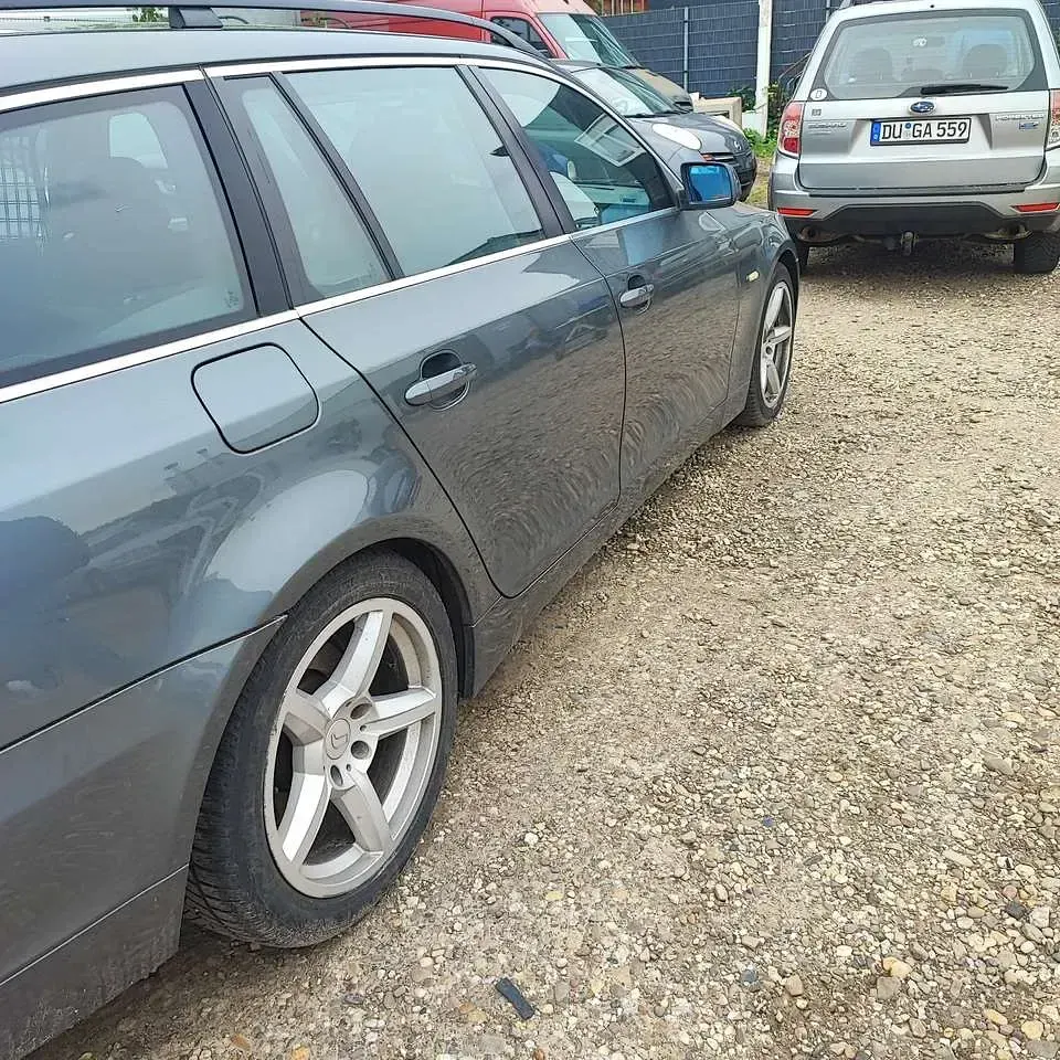 Gebraucht BMW 520 163 PS (119 kW) 2006 Titangrau ii metallic Kombi
