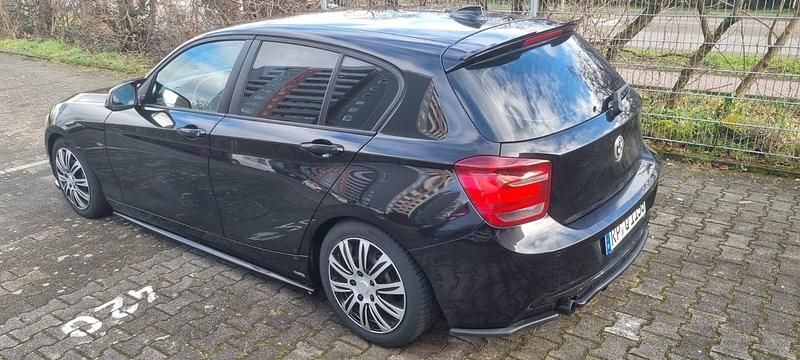 Gebraucht BMW 118 Sport Line 170 PS (125 kW) 2012 Schwarz Kleinwagen