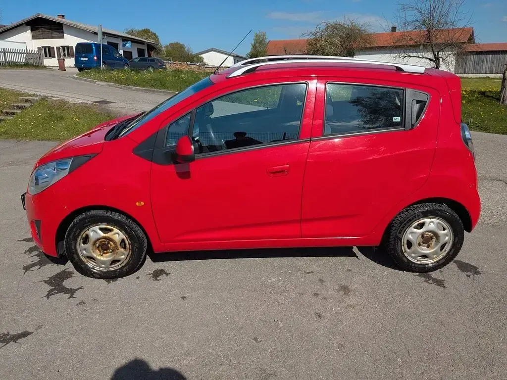 Second-hand Chevrolet Spark LS 82 CP (60 kW) 2011 Roșu Hatchback