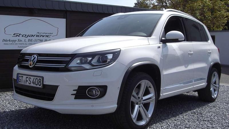 Candyweiß Gebraucht 2012 VW Tiguan Sportline SUV | 16.800 € - Bild 1/4