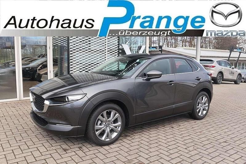 Machine gray Gebraucht 2024 Mazda CX-30 Exclusive-Line SUV | 31.985 € (Etwas zu teuer) - Bild 1/4