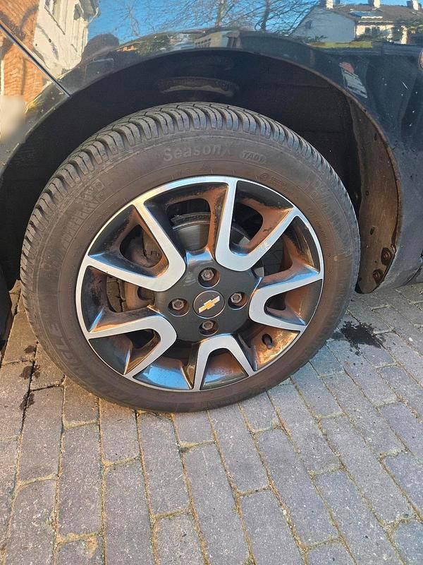 Gebraucht Chevrolet Spark 68 PS (50 kW) 2012 Schwarz Kleinwagen