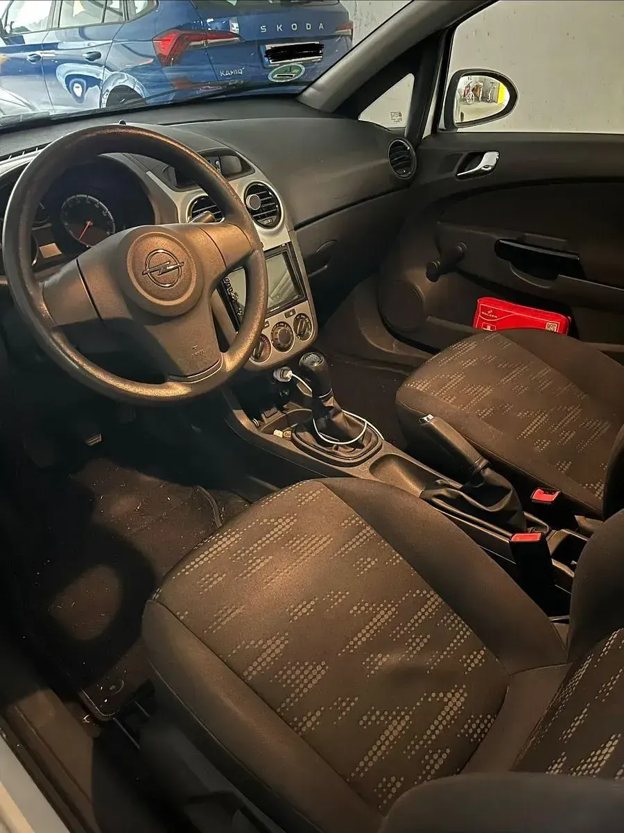 Gebraucht Opel Corsa 69 PS (50 kW) 2014 Weiß Kleinwagen
