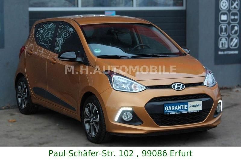 Orange Gebraucht 2015 Hyundai i10 Edition Kleinwagen | 5.990 € (Guter Preis) - Bild 1/4