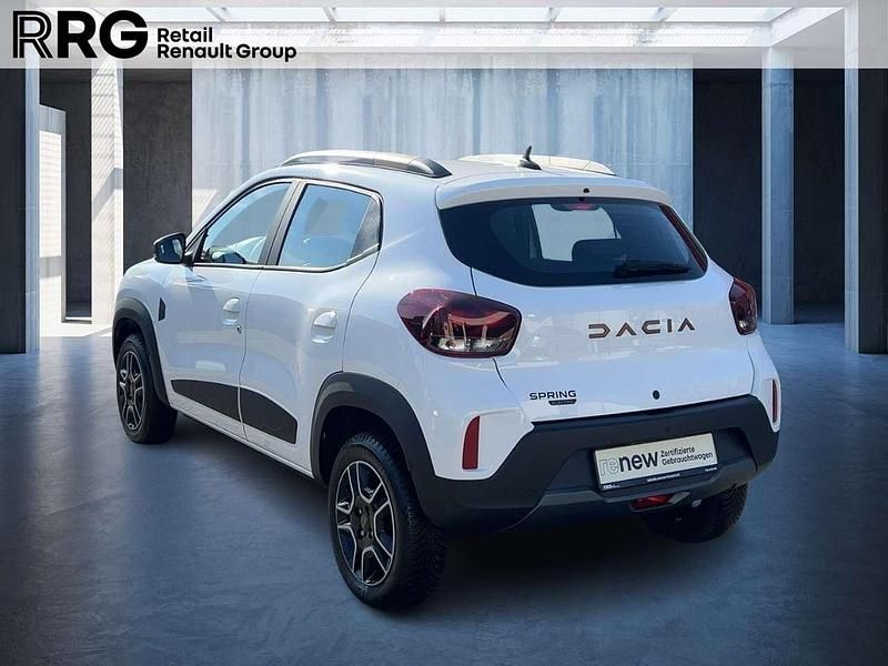 Gebraucht Dacia Spring Extreme 19 kW (26 PS) 2024 Kaolinweiß Kleinwagen