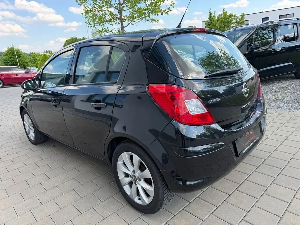 Gebraucht Opel Corsa Active 87 PS (63 kW) 2014 Schwarz Kleinwagen