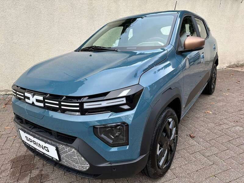 Blau (schieferblau) Neu 2024 Dacia Spring Extreme Kleinwagen | 18.999 € (Fairer Preis) - Bild 1/4