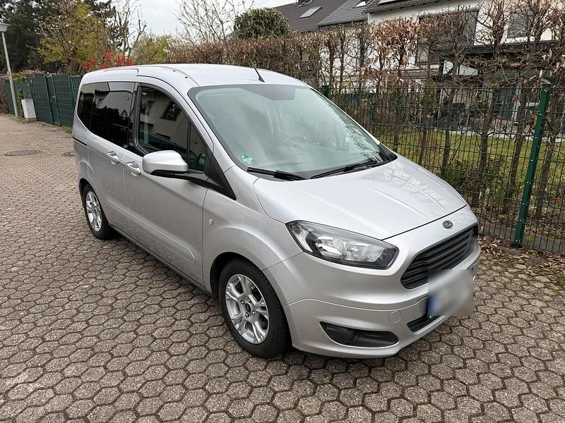 Gebraucht Ford Tourneo Courier 101 PS (74 kW) 2018 Silber Van / Kleinbus