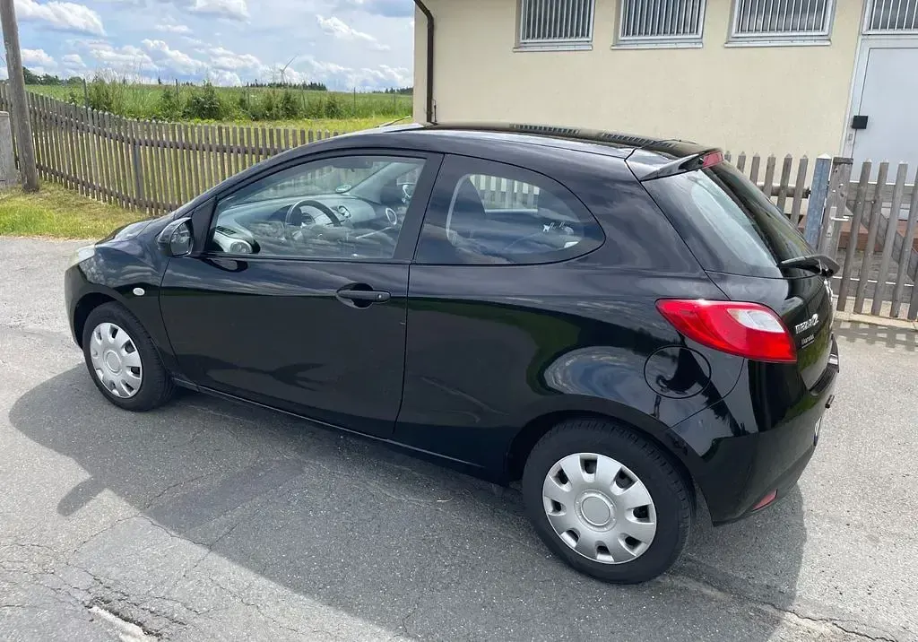Gebraucht Mazda 2 Impuls 75 PS (55 kW) 2009 Schwarz Kleinwagen