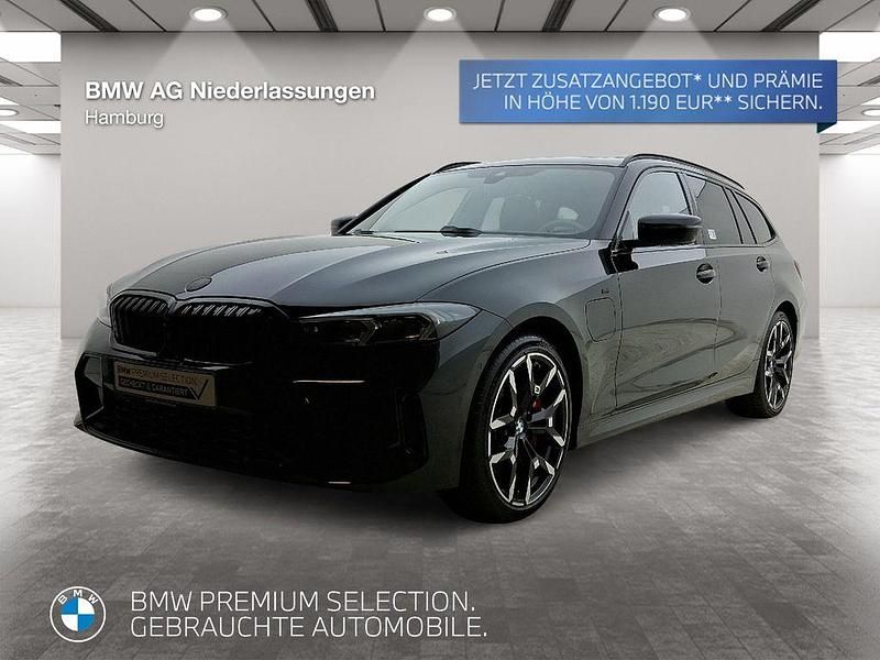 Schwarz Gebraucht 2024 BMW 330e M Sport Kombi | 54.233 € - Bild 1/4