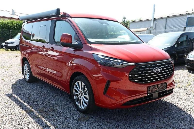 Artisan red metallic Neu 2025 Ford Tourneo Custom Nugget Van / Kleinbus | 60.055 € (Superpreis) - Bild 1/4