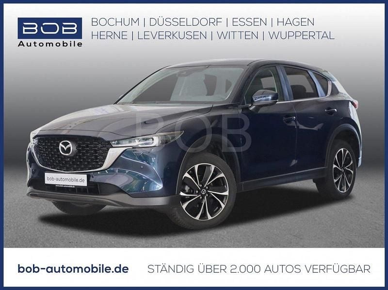 Deep crystal blue (blau) (blau) Gebraucht 2024 Mazda CX-5 Ad'Vantage SUV | 31.790 € (Superpreis) - Bild 1/3