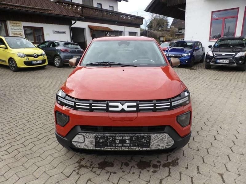 Gebraucht Dacia Spring Extreme 47 kW (65 PS) 2024 Rouge brick Kleinwagen
