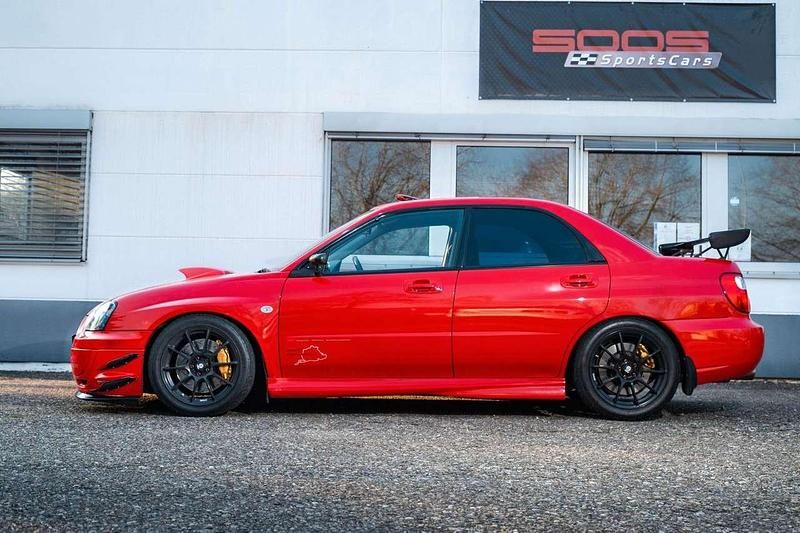Second-hand Subaru Impreza 265 CP (194 kW) 2003 Roșu Berlinǎ