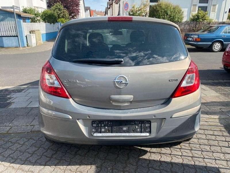 Gebraucht Opel Corsa Active 95 PS (69 kW) 2013 Muskatgrau/muskat braun(m2) Kleinwagen