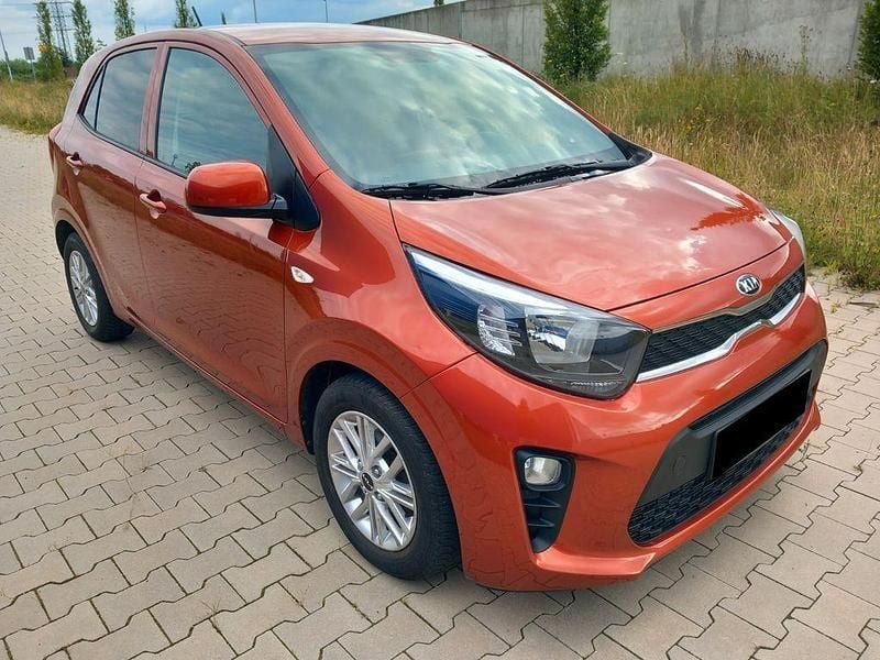 Orange Gebraucht 2021 Kia Picanto DREAM-TEAM Edition Kleinwagen | 10.900 € (Fairer Preis) - Bild 1/4