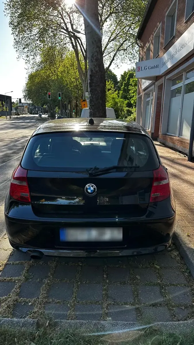 Używany BMW 116 122 KM (89 kW) 2007 Czarny Hatchback