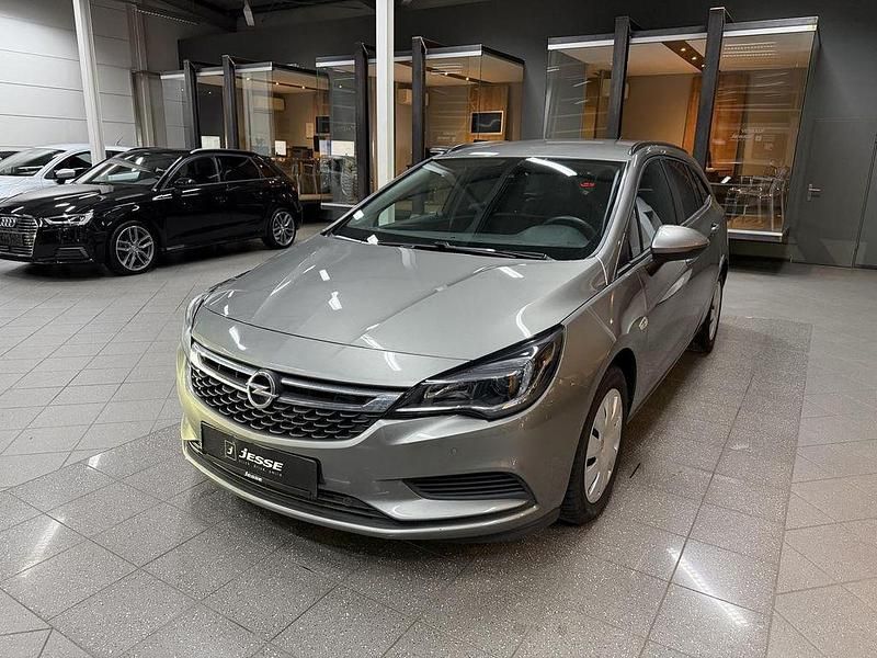 Braun Gebraucht 2016 Opel Astra Business Kombi | 10.990 € (Fairer Preis) - Bild 1/4