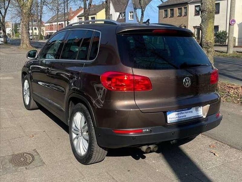 Gebraucht VW Tiguan Cup 160 PS (117 kW) 2014 Toffeebraun metallic SUV