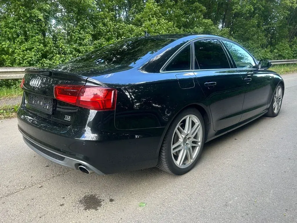 Używany Audi A6 S-Line 245 KM (180 kW) 2014 Czarny Sedan/Limuzyna