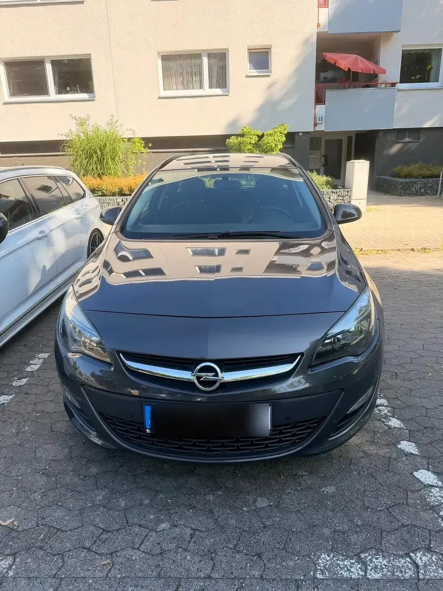 Gebraucht Opel Astra 120 PS (88 kW) 2014 Grau Kombi