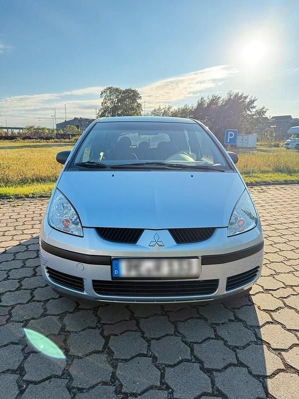Grau Gebraucht 2004 Mitsubishi Colt Kleinwagen | 1.500 € (Fairer Preis) - Bild 1/4