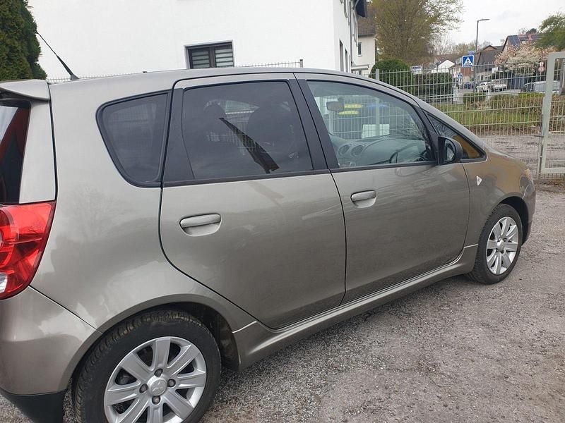 Gebraucht Mitsubishi Colt Motion 95 PS (69 kW) 2012 Grau Kleinwagen