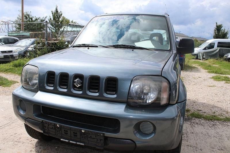 Grau Gebraucht 2006 Suzuki Jimny SUV | 5.999 € (Fairer Preis) - Bild 1/4