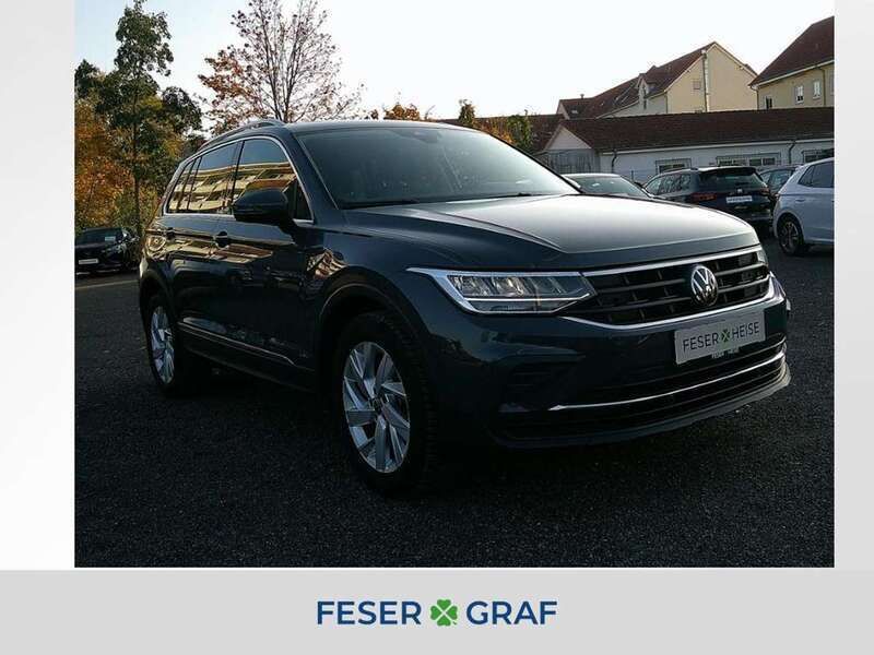 Delfingrau metallic Gebraucht 2024 VW Tiguan Move SUV | 28.880 € (Guter Preis) - Bild 1/4