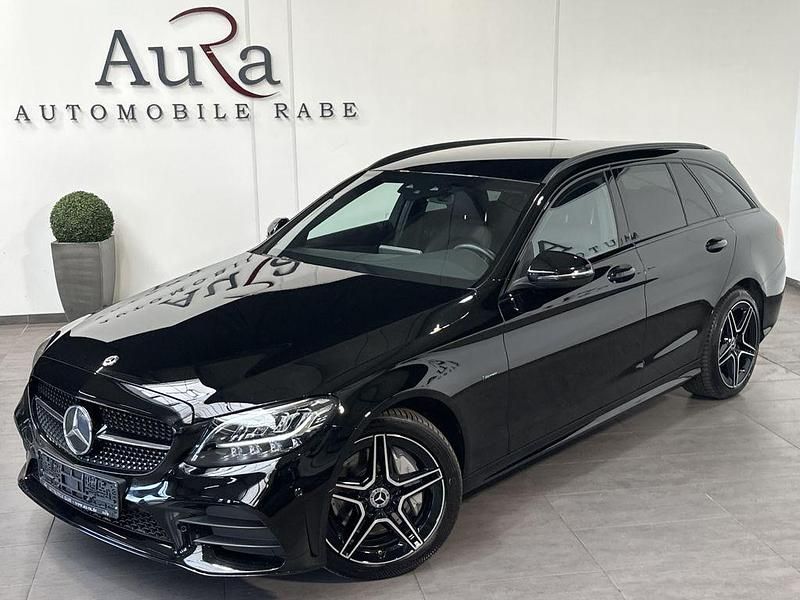 Schwarz Gebraucht 2021 Mercedes C300e AMG line Limousine | 29.449 € (Fairer Preis) - Bild 1/4