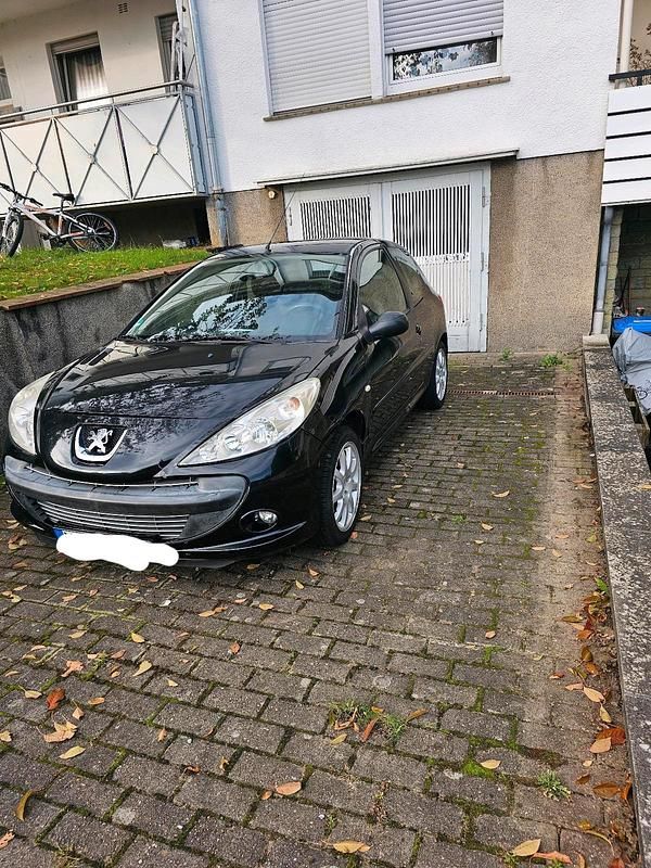 Gebraucht Peugeot 206+ 60 PS (44 kW) 2009 Schwarz Kleinwagen