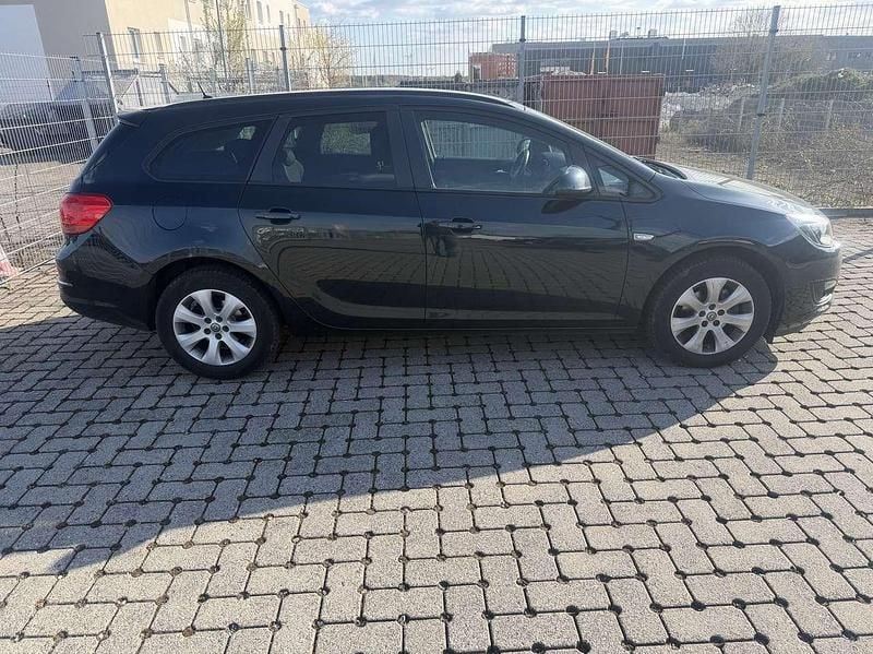 Używany Opel Astra Style 140 KM (102 kW) 2014 Zielony Kombi