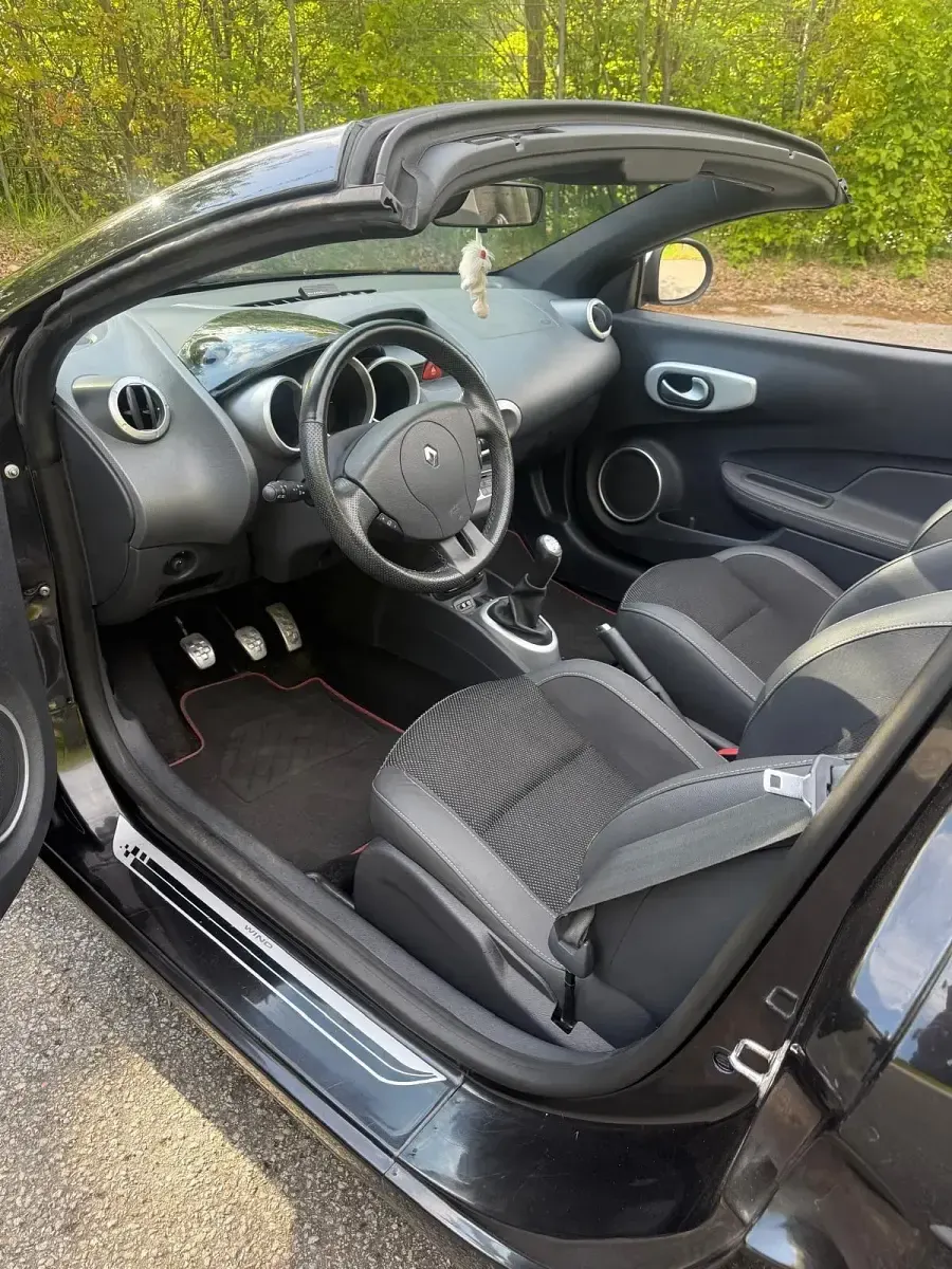 Gebraucht Renault Wind 101 PS (74 kW) 2011 Schwarz Cabrio