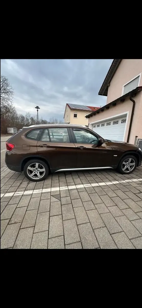 Używany BMW X1 177 KM (130 kW) 2012 Brązowy SUV