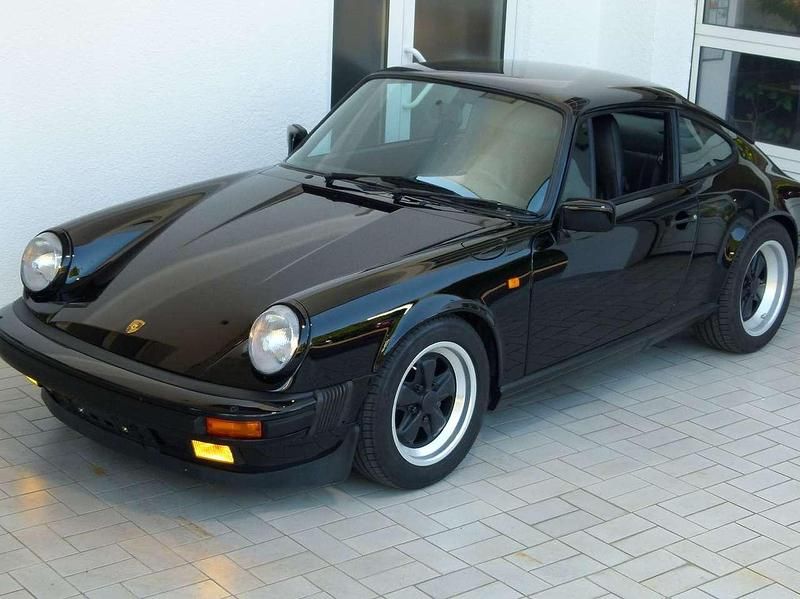 Schwarz Gebraucht 1986 Porsche 911 Carrera Coupé | 69.900 € - Bild 1/4