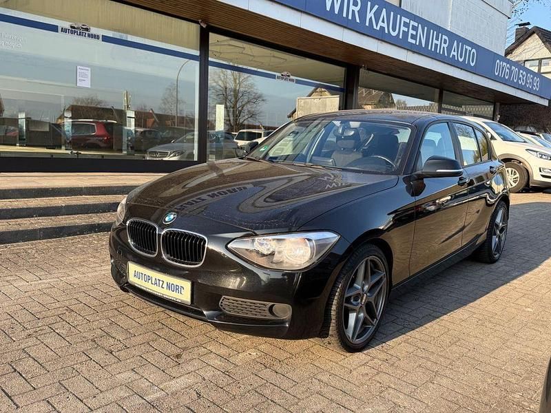 Schwarz Gebraucht 2012 BMW 116 Sport Line Kleinwagen | 6.799 € (Fairer Preis) - Bild 1/4