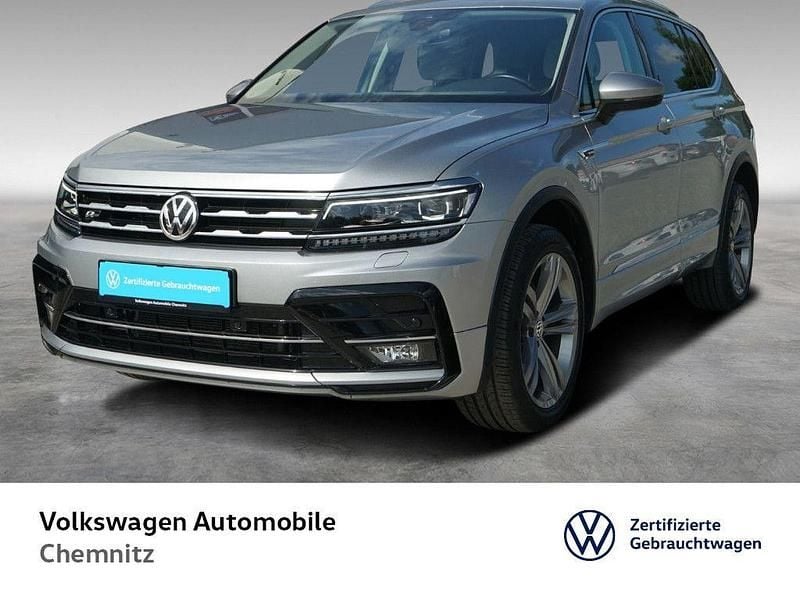 Pyritsilber metallic Gebraucht 2020 VW Tiguan Allspace Highline SUV | 25.940 € (Superpreis) - Bild 1/4