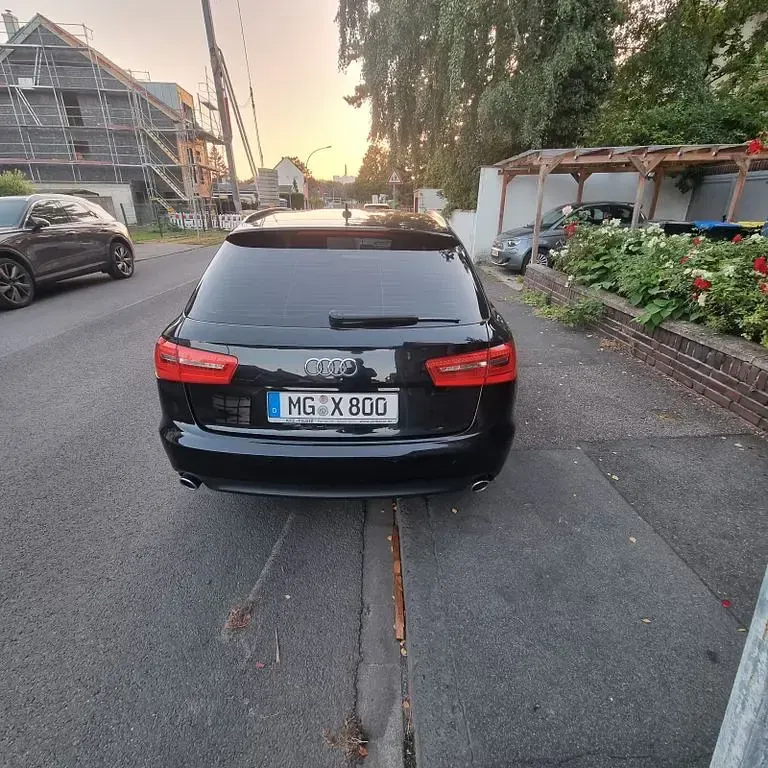 Używany Audi A6 204 KM (150 kW) 2014 Czarny Kombi