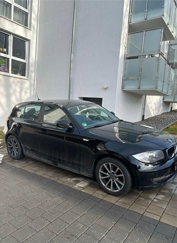Second-hand BMW 116 122 CP (89 kW) 2010 Negru Hatchback