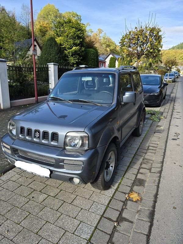 Grau Gebraucht 2007 Suzuki Jimny SUV | 7.575 € (Superpreis) - Bild 1/4
