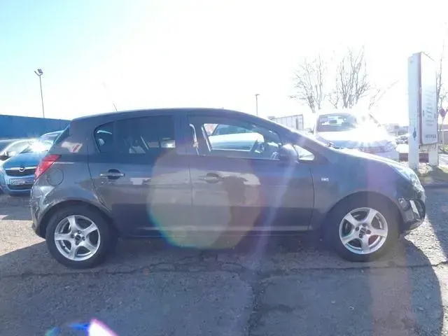 Używany Opel Corsa 101 KM (74 kW) 2012 Szary Hatchback