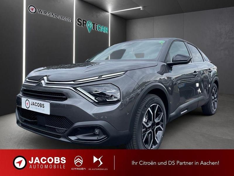 Grau Gebraucht 2023 Citroën e-C4 Shine Limousine | 22.470 € (Fairer Preis) - Bild 1/4