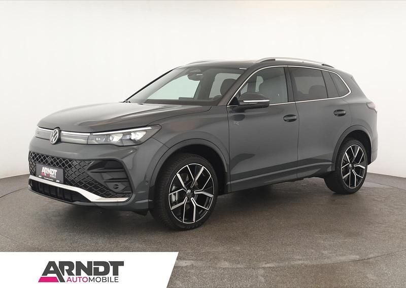 Grau Gebraucht 2024 VW Tiguan R-line SUV | 48.484 € (Superpreis) - Bild 1/4
