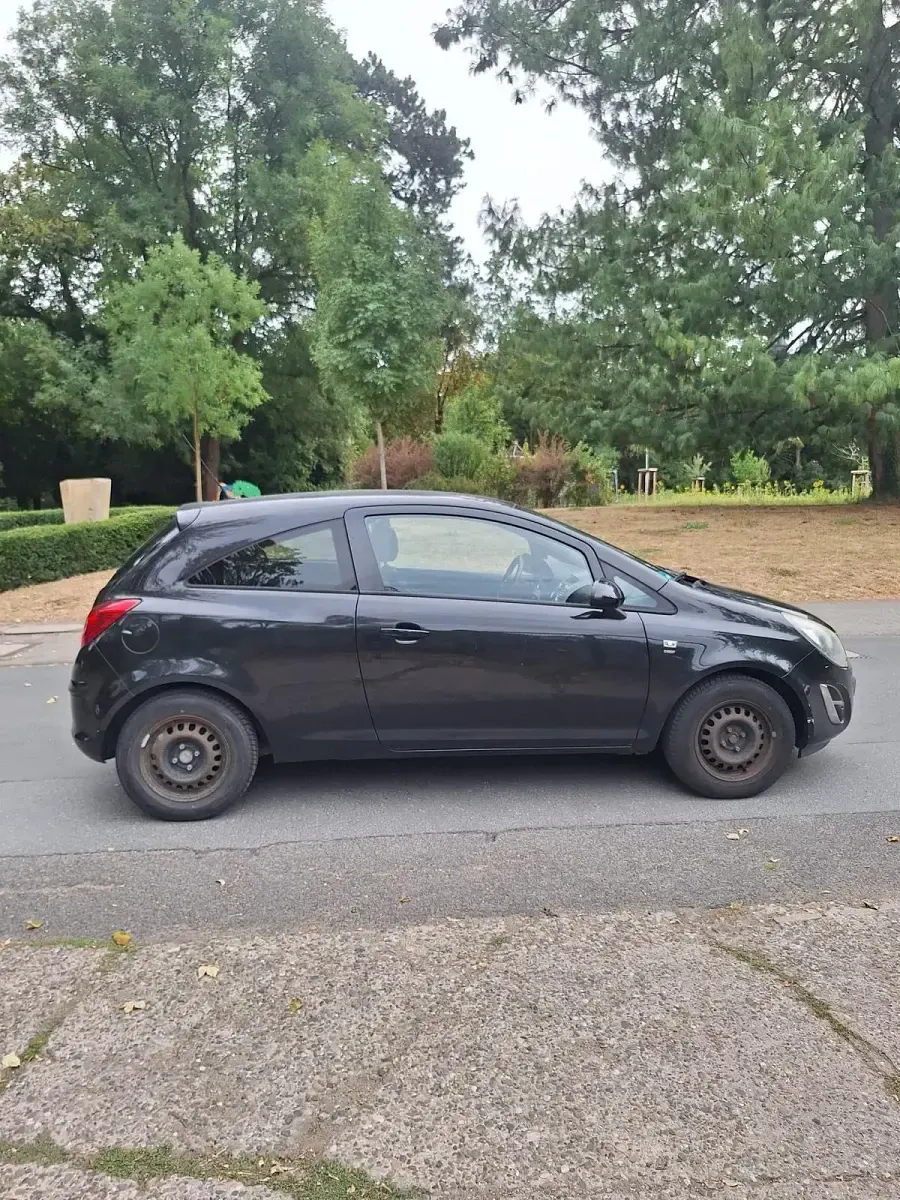 Gebraucht Opel Corsa 68 PS (50 kW) 2014 Schwarz Kleinwagen