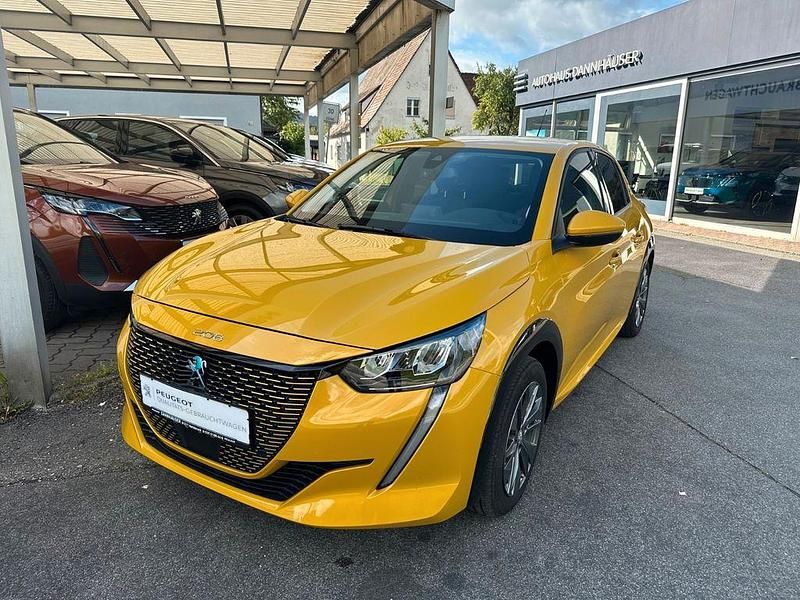 Gelb Gebraucht 2021 Peugeot e-208 Allure Kleinwagen | 16.490 € (Fairer Preis) - Bild 1/4